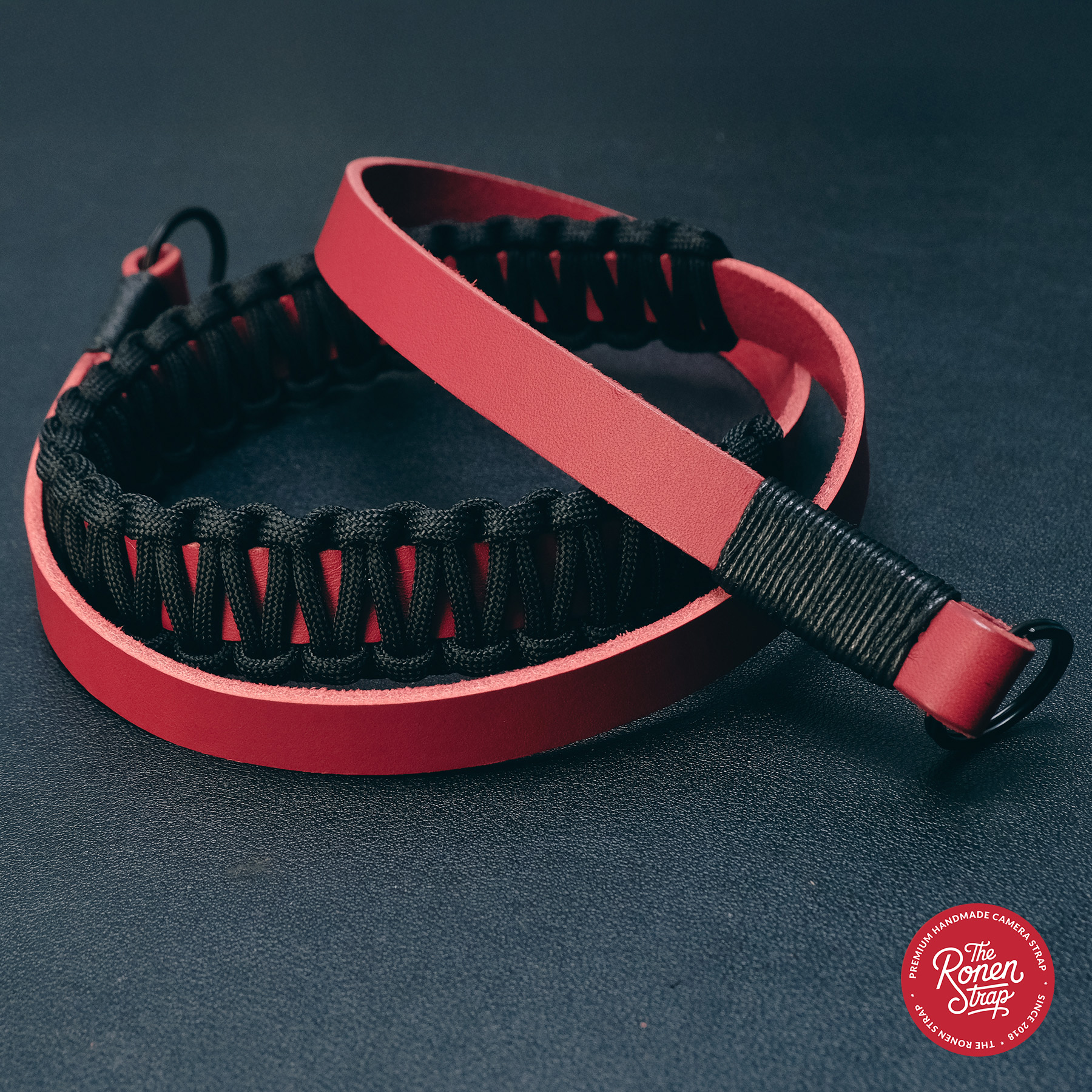 Bold Red Leather with Black Paracord padding camera strap for mirrorless camera
