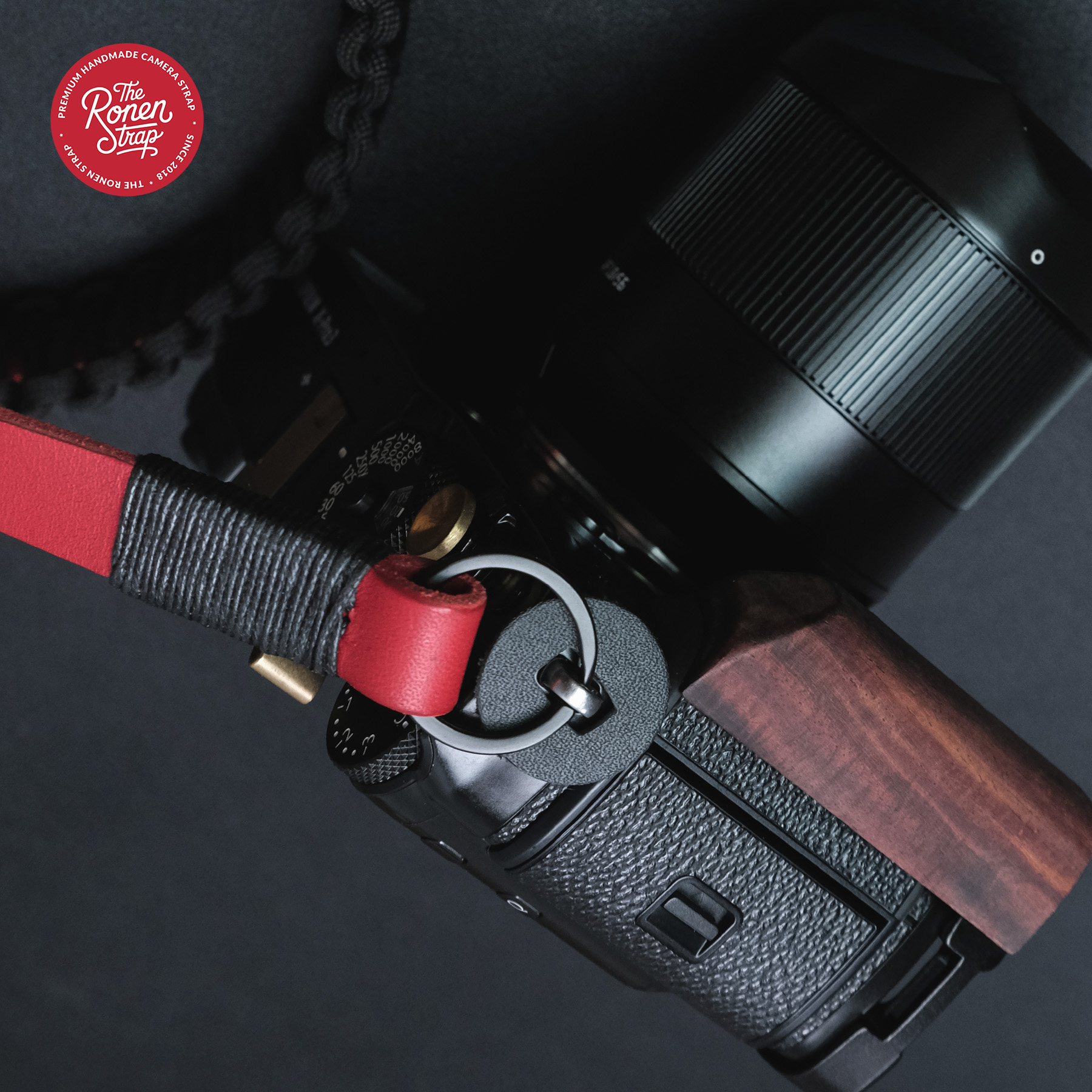Bold Red Leather with Black Paracord padding camera strap for mirrorless camera