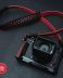 Bold Red Leather with Black Paracord padding camera strap for mirrorless camera